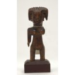 A TRIBAL OGONI FIGURE. Nigeria. 9cm x 6cm x 24cm