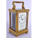 A CASED GOLDSMITH SILVERSMITH CARRIAGE CLOCK. 16 cm high inc handle.