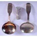 TWO ANTIQUE SILVER CADDY SPOONS and a scent bottle. (3)