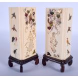 A FINE PAIR OF 19TH CENTURY JAPANESE MEIJI PERIOD CARVED IVORY SHIBAYAMA VASES decorated with figure
