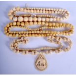 THREE ANTIQUE IVORY NECKLACES. (3)