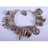 A SILVER CHARM BRACELET. 65 grams.