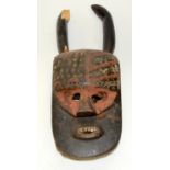 A TRIBAL TOMA ANGBAI MASK. Liberia. 26cm x 14cm x 68cm