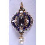 A FINE VICTORIAN ROYAL PRESENTATION GOLD GARNET AND ENAMEL PENDANT Made by the Queens Jeweller, with