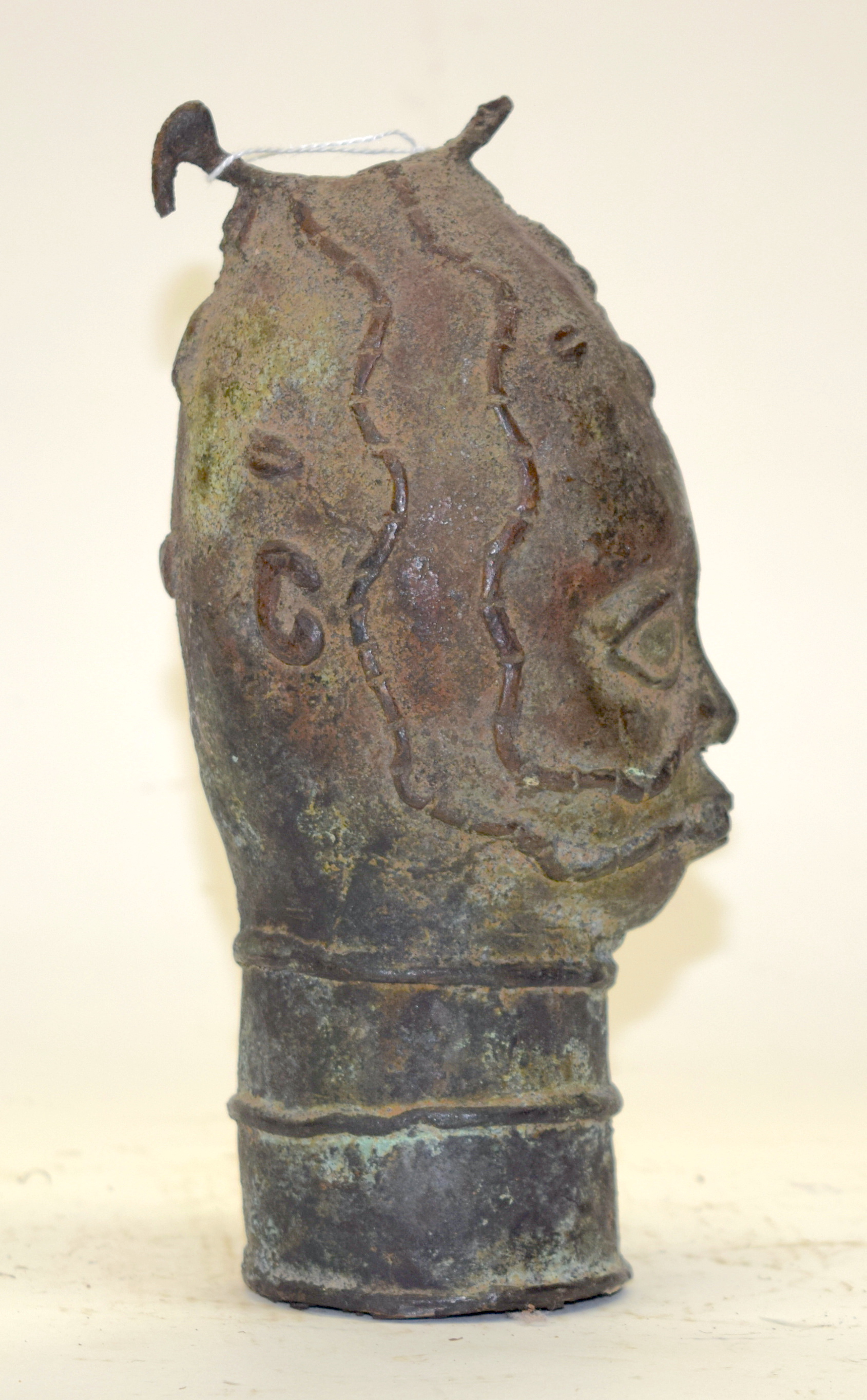 A TRIBAL BRONZE (POSSIBLY BENIN) HEAD. Nigeria. 9cm x 10cm x 24cm - Image 2 of 4