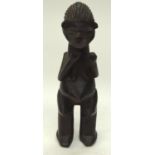 A TRIBAL PENDE FIGURE. DR Congo. 12cm x 12cm x 38cm