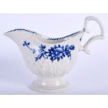 AN 18TH CENTURY LIVERPOOL OF HELMET SHAPE JUG with leaf moulding painted with flowers. 11 cm x 15.5