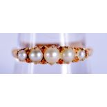 AN 18CT GOLD SEED PEARL RING. P/Q. 3.2 grams.