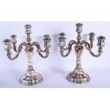 A LARGE PAIR OF 19TH CENTURY CONTINENTAL SILVER CANDLESTICKS. 80 oz. 39 cm x 18 cm.