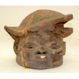 A TRIBAL YORUBA GELEDE HELMET MASK. Nigeria. 29cm x 21cm x 30cm