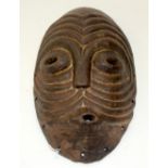 AFRICAN TRIBAL MASK. 22cm x 10cm x 36cm