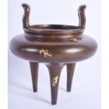 A CHINESE GOLD SPLASH BRONZE CENSER. 9 cm wide, internal width 5.5 cm.