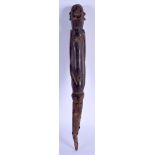 A TRIBAL AFRICAN CARVED WOOD HOUSE MARKER with iron mounts. 36 cm long.