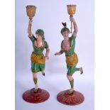 A PAIR OF ANTIQUE COLD PAINTED SPELTER FIGURES OF TURKS modelled upon foliate bases. 40 cm high.