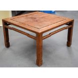 A CHINESE CARVED HARDWOOD LOW TABLE. 53 cm x 31 cm.