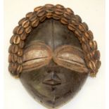 A TRIBAL DEANGLE DAN MASK. Ivory Coast. 23cm x 10cm x 28cm