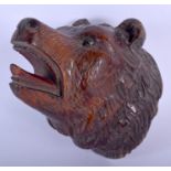 A LATE 19TH CENTURY BAVARIAN BLACK FOREST WALL MASK in the form of a bear. 14 cm x 9 cm.
