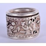 A CHINESE WHITE METAL ARCHERS RING. 2.75 cm wide.