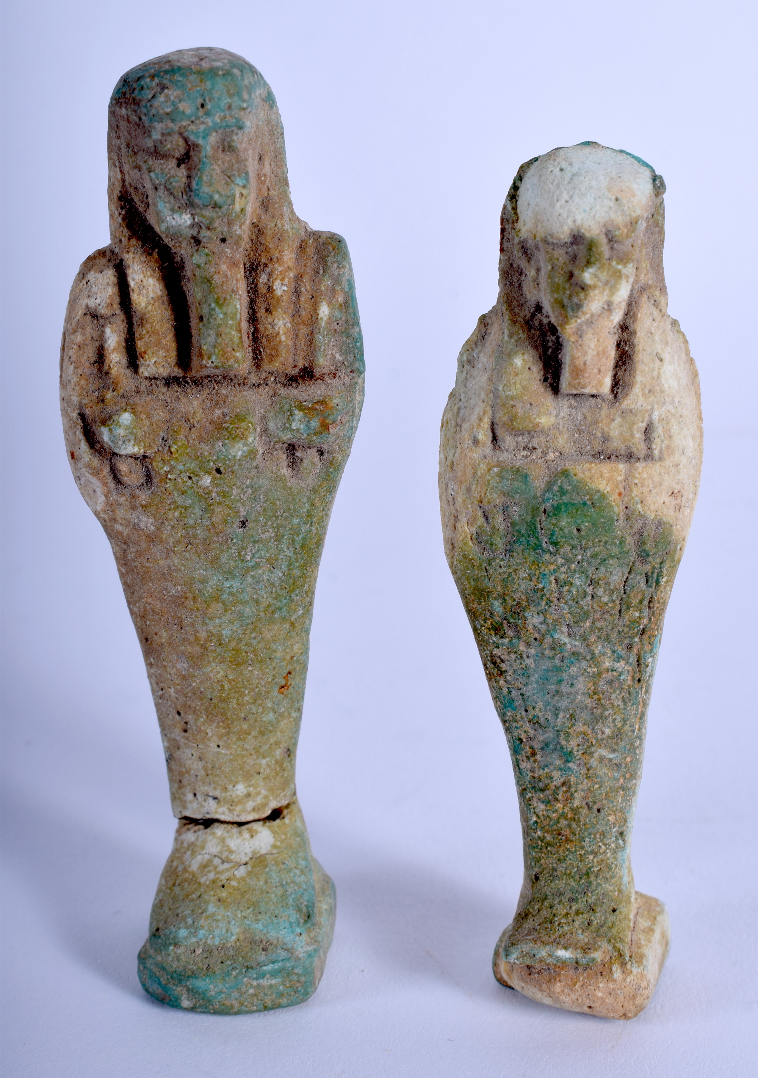 TWO EGYPTIAN FAIENCE USHABTI. 8 cm high. (2)