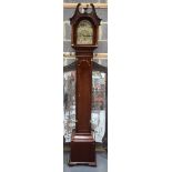 A GOOD EDWARDIAN MAHOGANY GRANDMOTHER CLOCK with arch top pediment. Dial 17 cm square, 197 cm high.