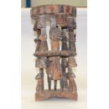 A TRIBAL YORUBA STOOL. Nigeria. 27cm x 28cm x 54cm