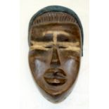 A TRIBAL YACOUBE DAN MASK. Nigeria. 16cm x 9cm x 27cm