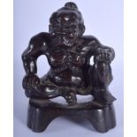 AN 18TH/19TH CENTURY JAPANESE EDO PERIOD BRONZE FIGURE OF A SUMO WRESTLER modelled upon an open work