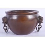 A CHINESE TWIN HANDLED BRONZE CENSER 20th Century. 11 cm wide, internal width 9 cm.