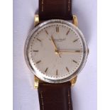 A VINTAGE GOLD INTERNATIONAL WATCH COMPANY WRISTWATCH with silvered dial. 3 cm diameter.