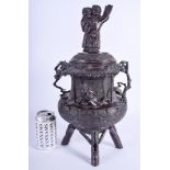 A LARGE 19TH CENTURY JAPANESE MEIJI PERIOD BRONZE CENSER AND COVER formed with a male inside a build