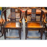 A PAIR OF CHINESE SOFTWOOD ARMCHAIRS decorated with dragons. 106 cm high.