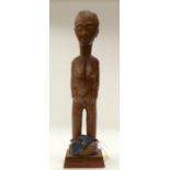 A TRIBAL BAULE SPIRIT SPOUSE FIGURE. Ivory Coast. 10cm x 10cm x 38cm