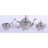 A MID 19TH CENTURY CONTINENTAL SILVER TEASET decorated with figures and foliage. 36.3 oz. Largest 21