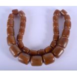 AN EARLY 20TH CENTURY CONTINENTAL CARVED BUFFALO HORN NECKLACE. 62 cm long.