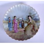 A RARE EARLY 20TH CENTURY JAPANESE MEIJI PERIOD PORCELAIN CHARGER painted with six geisha within a l