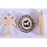 AN ANTIQUE YELLOW METAL AND IVORY HORSE BROOCH together with two other bone carvings. (3)