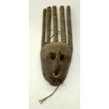 A TRIBAL BAMANA NTOMO MASK. Mali. 21cm x 13cm x 56cm