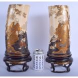 A FINE LARGE PAIR OF 19TH CENTURY JAPANESE MEIJI PERIOD GOLD LACQUERED IVORY TUSK VASES depicting sc