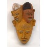 A TRIBAL YORUBA MASK. Nigeria. 10cm x 9cm x 18cm