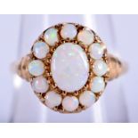 A CHARMING 9CT GOLD AND OPAL RING. P/Q. 2.8 grams.