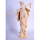 A 19TH CENTURY CHINESE CARVED BONE FIGURE OF A FEMALE modelled holding a basket in flowing robes. 2