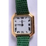 AN 18CT GOLD BAUME & MERCIER WRISTWATCH. 2.25 cm wide.