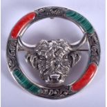 A SILVER BULL BROOCH. 4 cm wide.