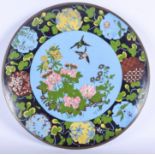 A 19TH CENTURY JAPANESE MEIJI PERIOD CLOISONNE ENAMEL CHARGER decorated with birds. 30 cm diameter.