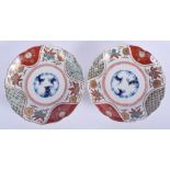 A PAIR OF 19TH CENTURY JAPANESE MEIJI PERIOD IMARI DISHES painted with foliage. 21 cm wide.
