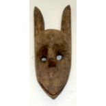 A TRIBAL BAMANA HYENA (SURUKU) MASK. Mali. 14cm x24cm x 44cm