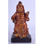 A 17TH/18TH CENTURY LACQUERED IRON FIGURE OF AN IMMORTAL modelled in robes. Iron 18 cm high.