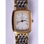 AN OMEGA TWO TONE LADIES WRISTWATCH. 1.5 cm wide.