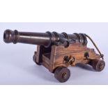 AN EARLY 19TH CENTURY CONTINENTAL BRONZE CANNON. 24 cm x 10 cm.