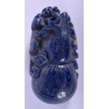 A CHINESE CARVED LAPIS LAZULI BOULDER. 3.75 cm x 5 cm.